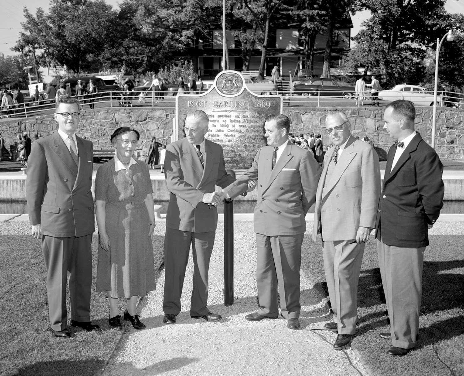 Port Carling plaque unveiling, from left: Mr. R.J. Boyer, MPP, Muskoka; Miss Elizabeth Penson; The Honourable Leslie Frost, Premier; The Honourable Bryan Cathcart; The Honourable William Griesinger; and Reeve Robert Bennett.