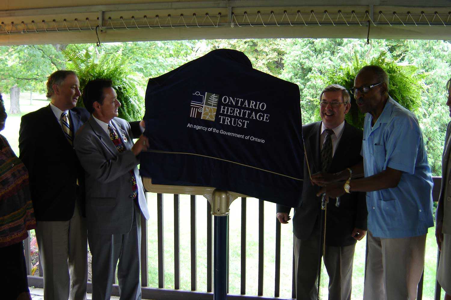 On August 23, 2007, this provincial plaque was unveiled to commemorate Chloe Cooley and the 1793 Act to Limit Slavery in Upper Canada. The plaque was unveiled by The Honourable Lincoln M. Alexander, then-Chairman of the Ontario Heritage Trust.