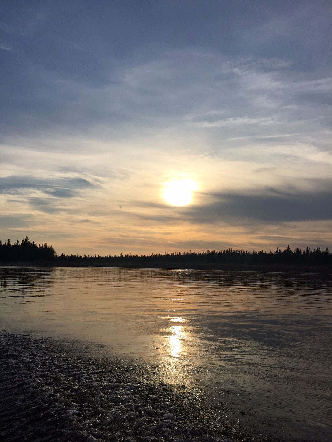 Sunset on the Moose River in Moose Factory. (Photo: Stan Kapashesit)