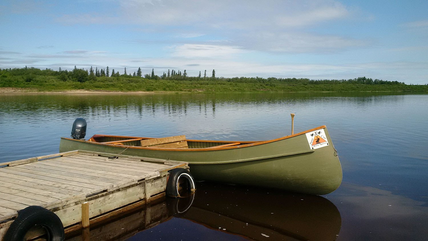The Ecolodge dock on the Moose River at Moose Factory Island.