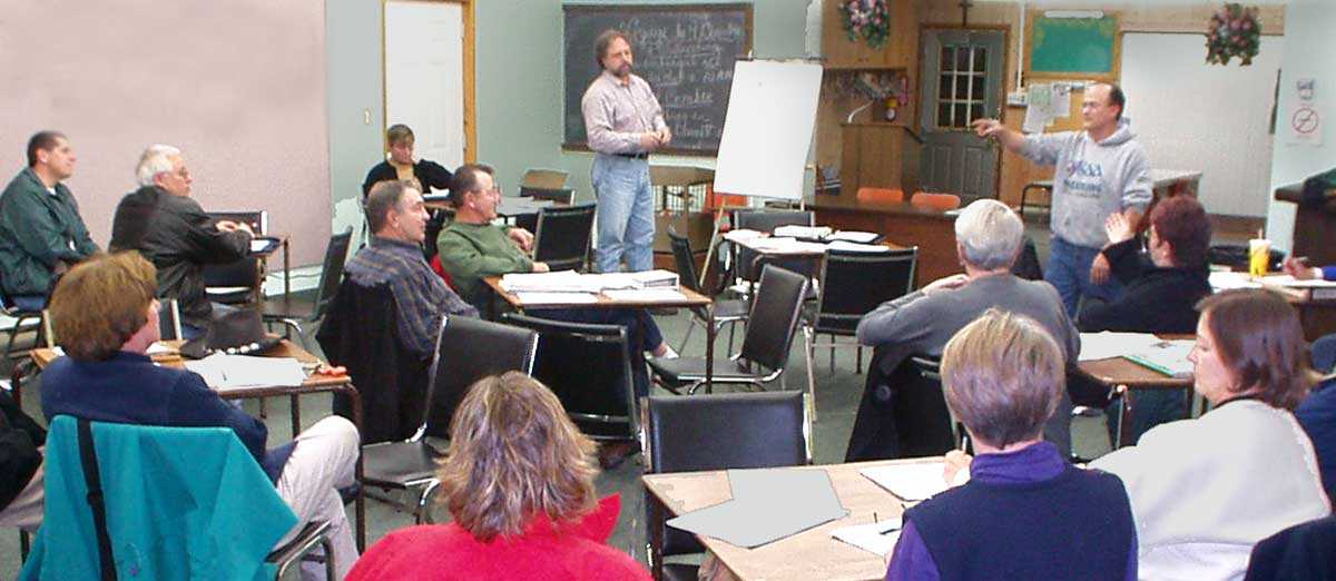 SOS-Églises at work. David Tremblay leads the discussion while Jérôme Baillargeon helps with the notes.